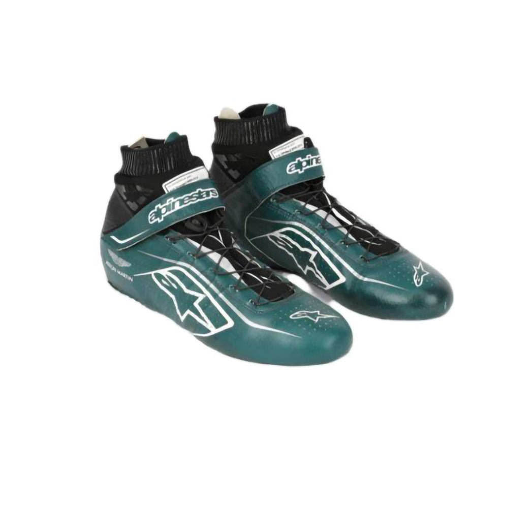 Pair of green Nico Hulkenberg 2022 F1 racing shoes with black accents on a white background