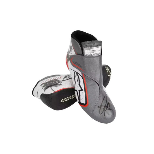 Pair of gray and black protective Nico Hulkenberg 2023 Miami GP Weekend Worn F1 Racing boots on a white background
