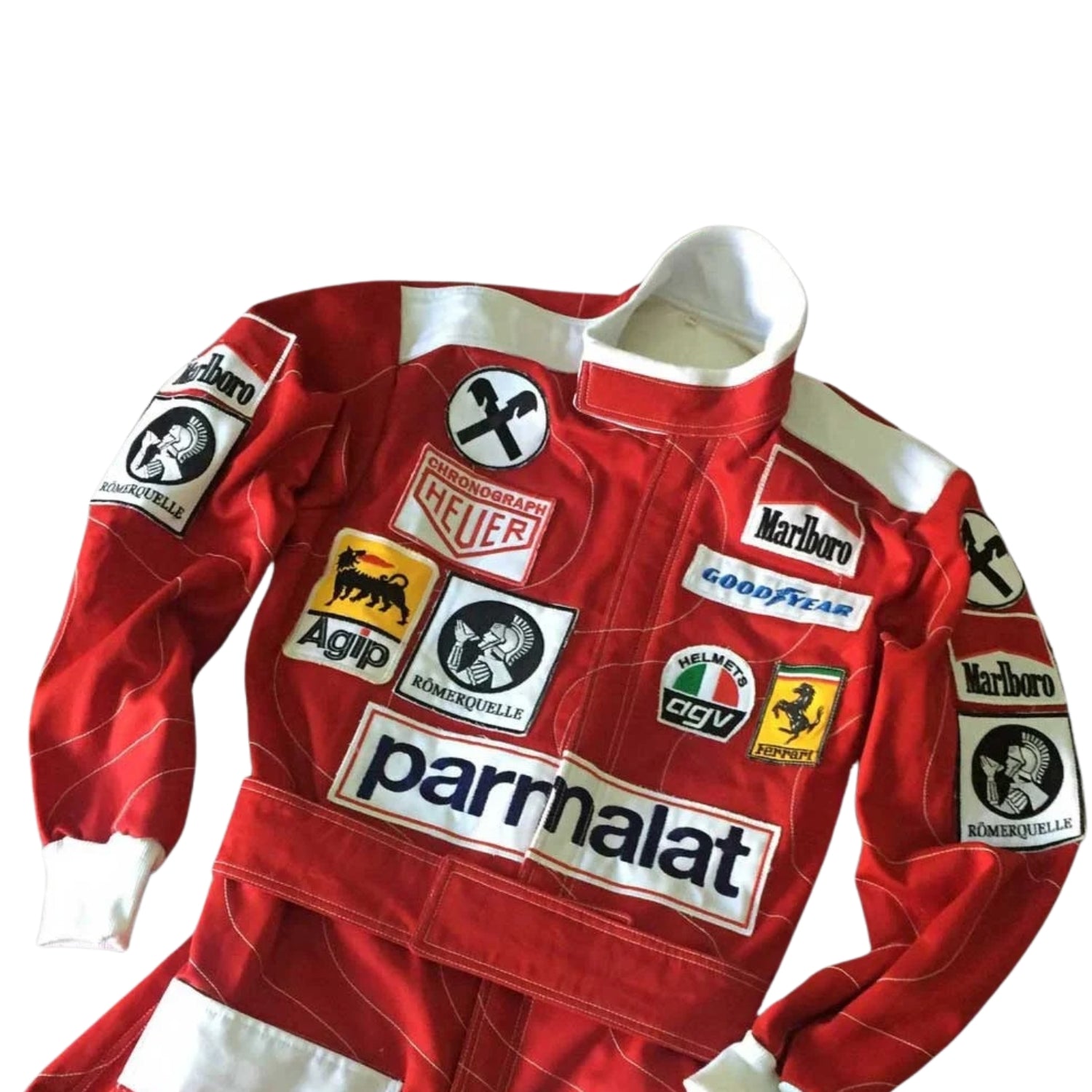 Close-up of Niki Lauda’s 1976 racing suit detailing, capturing the fine craftsmanship of Ferrari’s design and the sponsor logos, a testament to his legendary comeback.