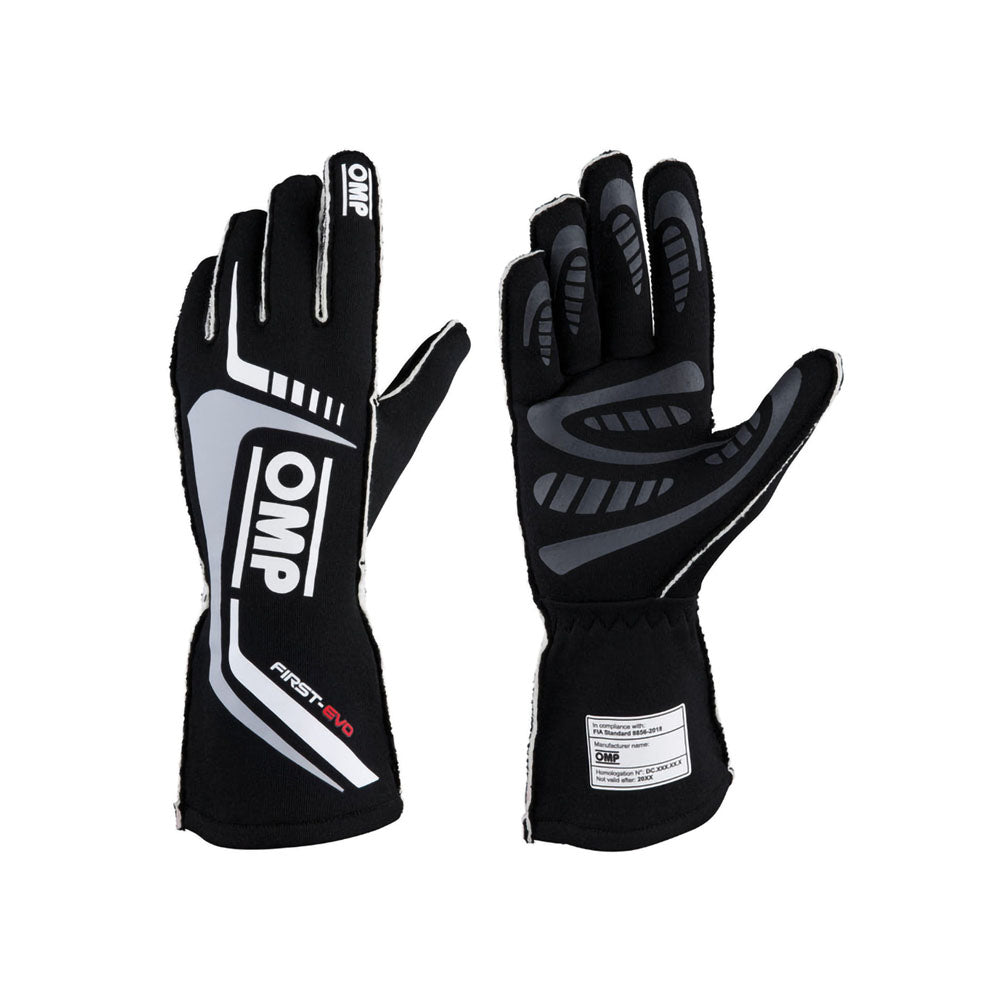 Pair of black and gray OMP First-EVO Racing gloves with OMP branding on a white background