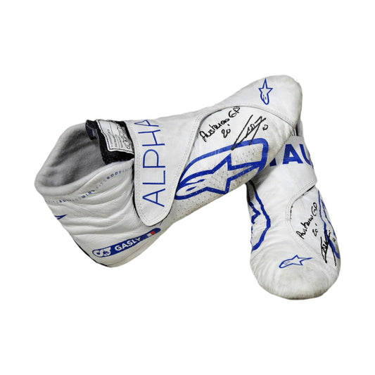 White and gray Pierre Gasly 2020 Austrian Grand Prix F1 Racing shoes with blue and black branding on a white background