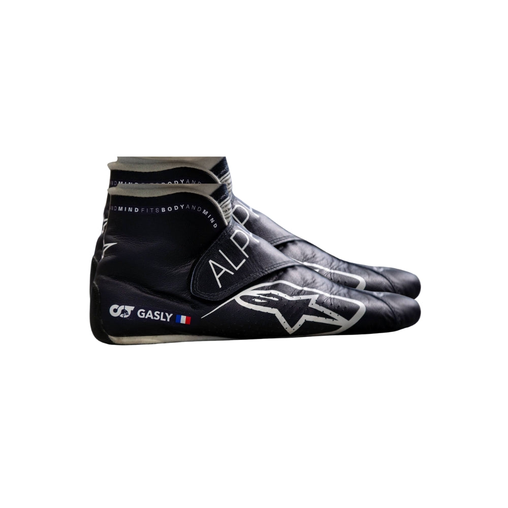 Black high-top Pierre Gasly 2022 F1 Racing shoes with branding on a white background