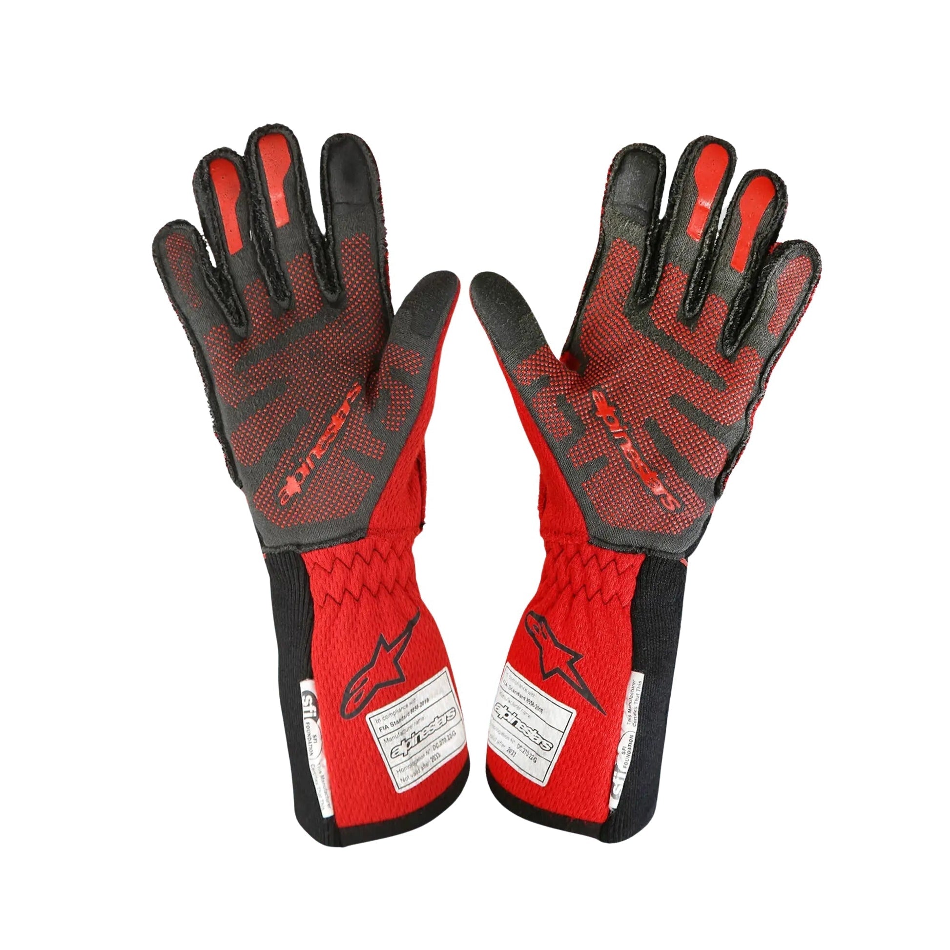 Pair of red and black Romain Grosjean 2023 IndyCar Racing gloves on a white background