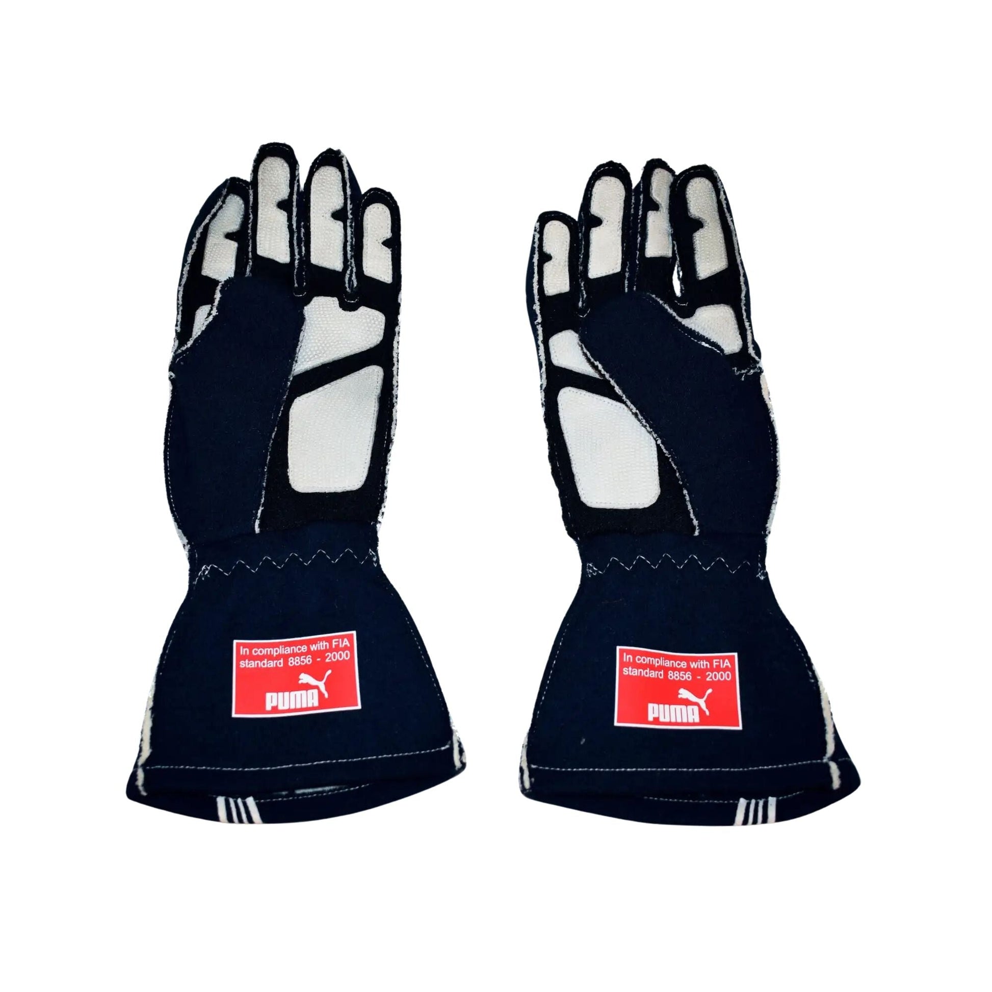 Pair of black Sebastian Vettel 2007/8 F1 racing gloves with Puma logos on a white background