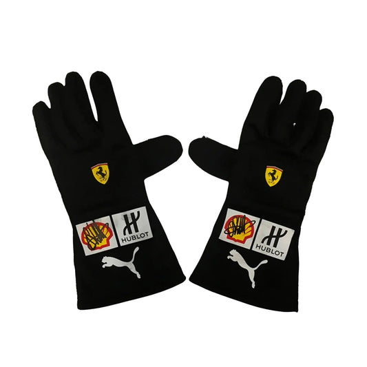 Pair of black Sebastian Vettel 2018 F1 gloves with logos on a white background