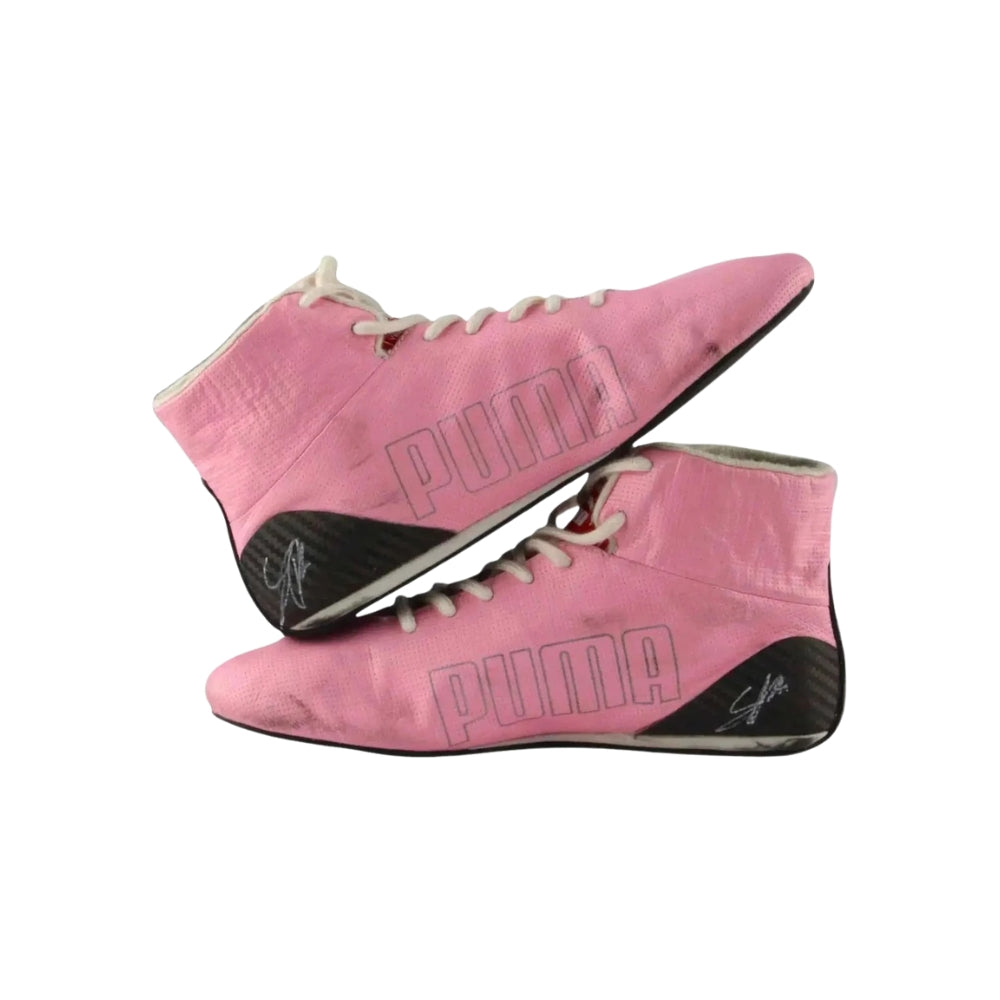 Pink high-top Sergio Perez 2019 F1 racing Puma shoes on a white background