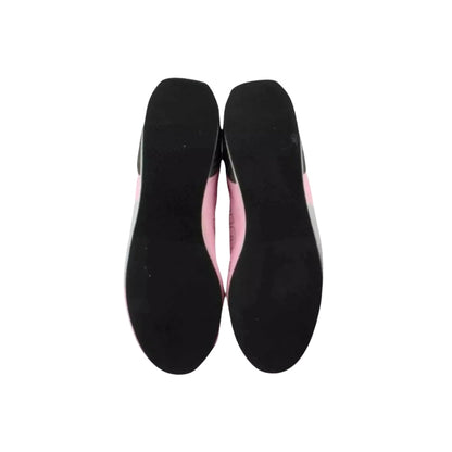 Black Sergio Perez 2019 F1 Racing shoe insoles with pink lining on a white background