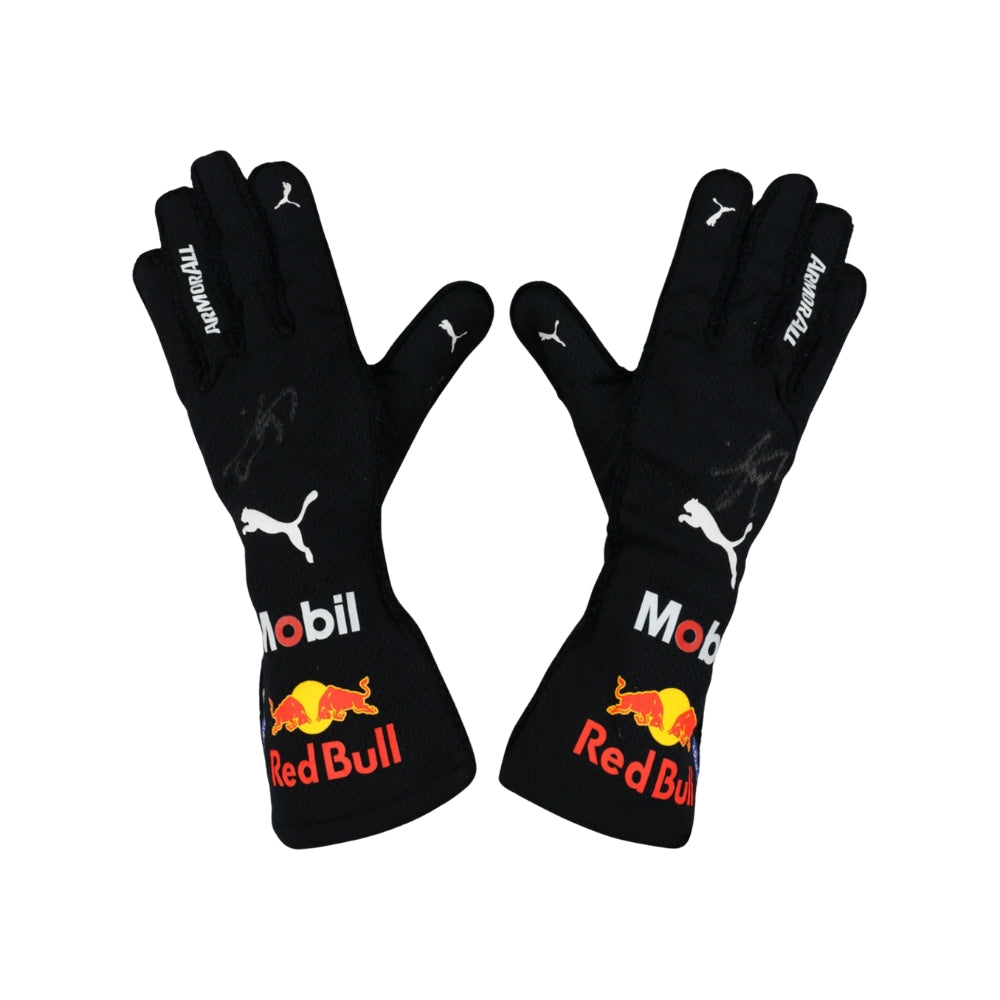 Black Sergio Perez 2022 F1 racing gloves with Red Bull and Puma logos on a white background