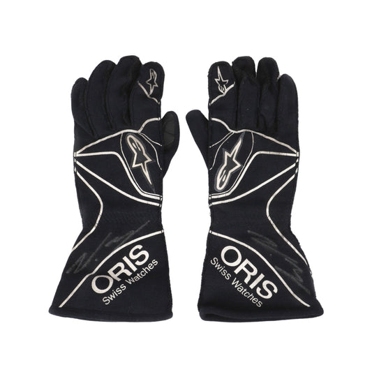 Pair of Valtteri Bottas 2015 black gloves with white branding on a white background
