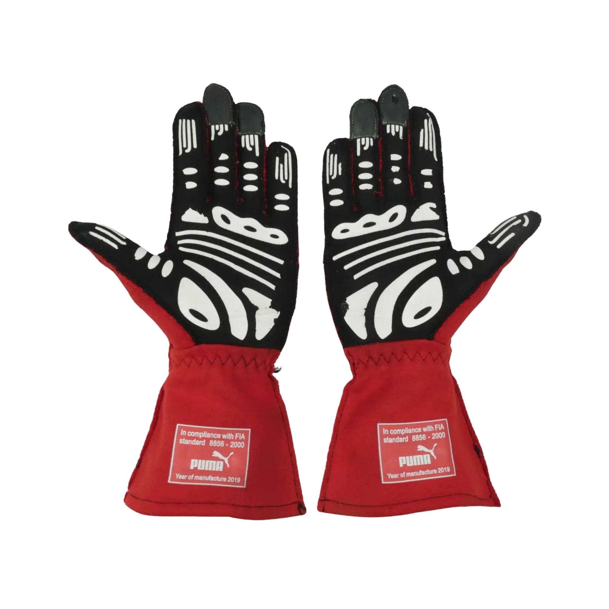 Pair of red and black Will Power 2020 IndyCar racing gloves with Puma branding on a white background