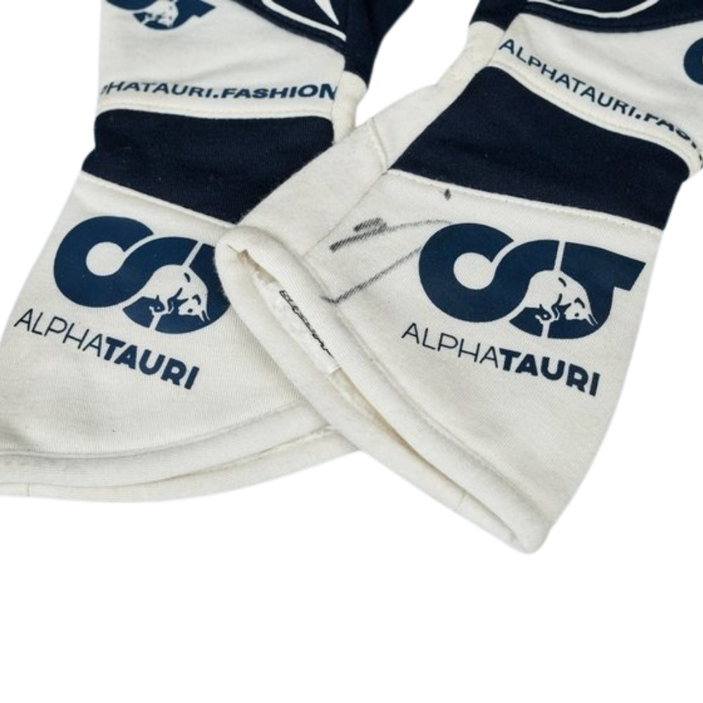 White and navy Yuki Tsunoda 2022 F1 Racing gloves with AlphaTauri logo on a white background