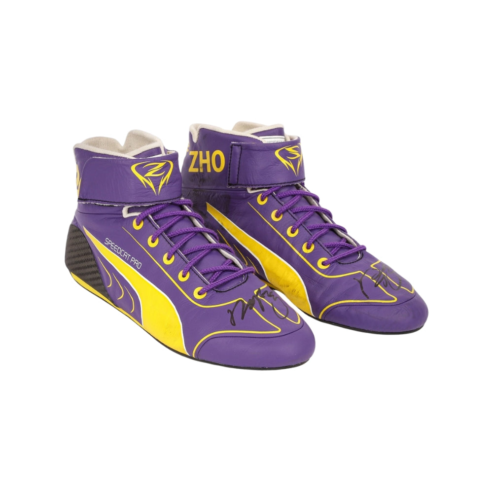 Purple and yellow high-top Zhou Guanyu 2023 Mexico City GP F1 Racing shoes with 'ZHO' branding on a white background